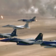 Two F-15E Strike Eagles, and F-15C Eagle, and two F-16 Fighting Falcons fly over the burning oil fields of Kuwait. (US Air Force)